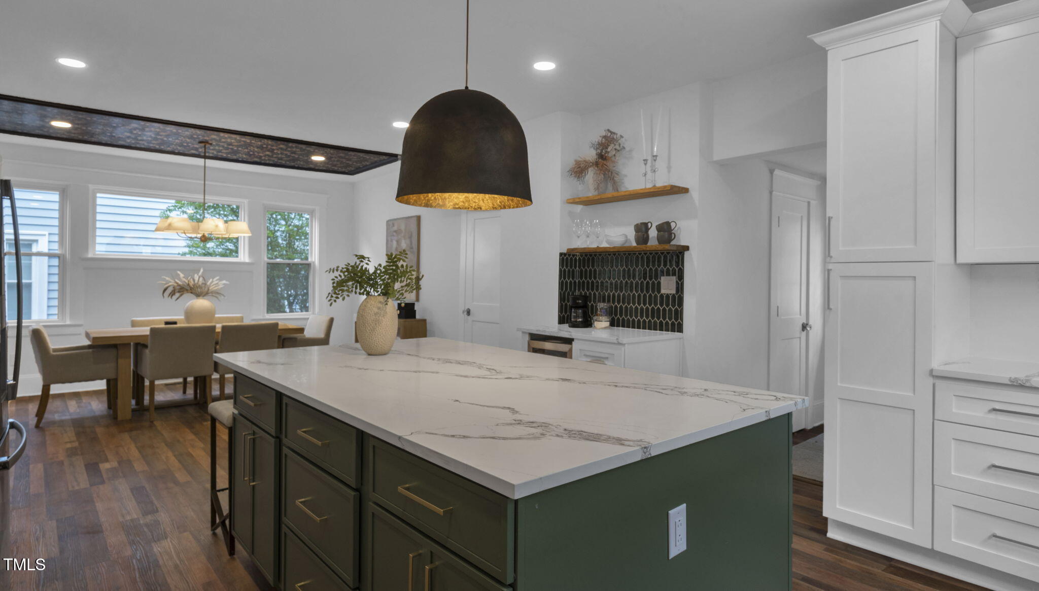 1307 Wake Forest Road Raleigh, NC 27604 - Photo 10 of 52 a kitchen with stainless steel appliances granite countertop a sink a stove and a refrigerator