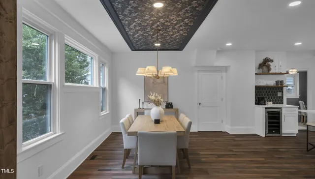 a kitchen with a sink a stove and a cabinets