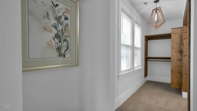 a bathroom with a shower and a sink