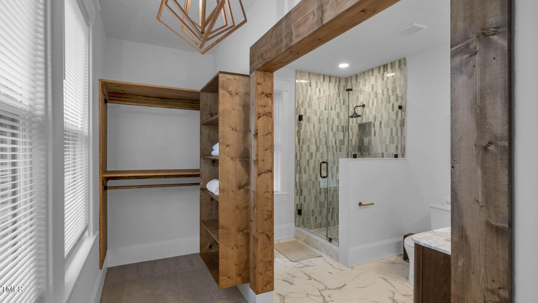 1307 Wake Forest Road Raleigh, NC 27604 - Photo 36 of 52 a bathroom with a shower and a sink