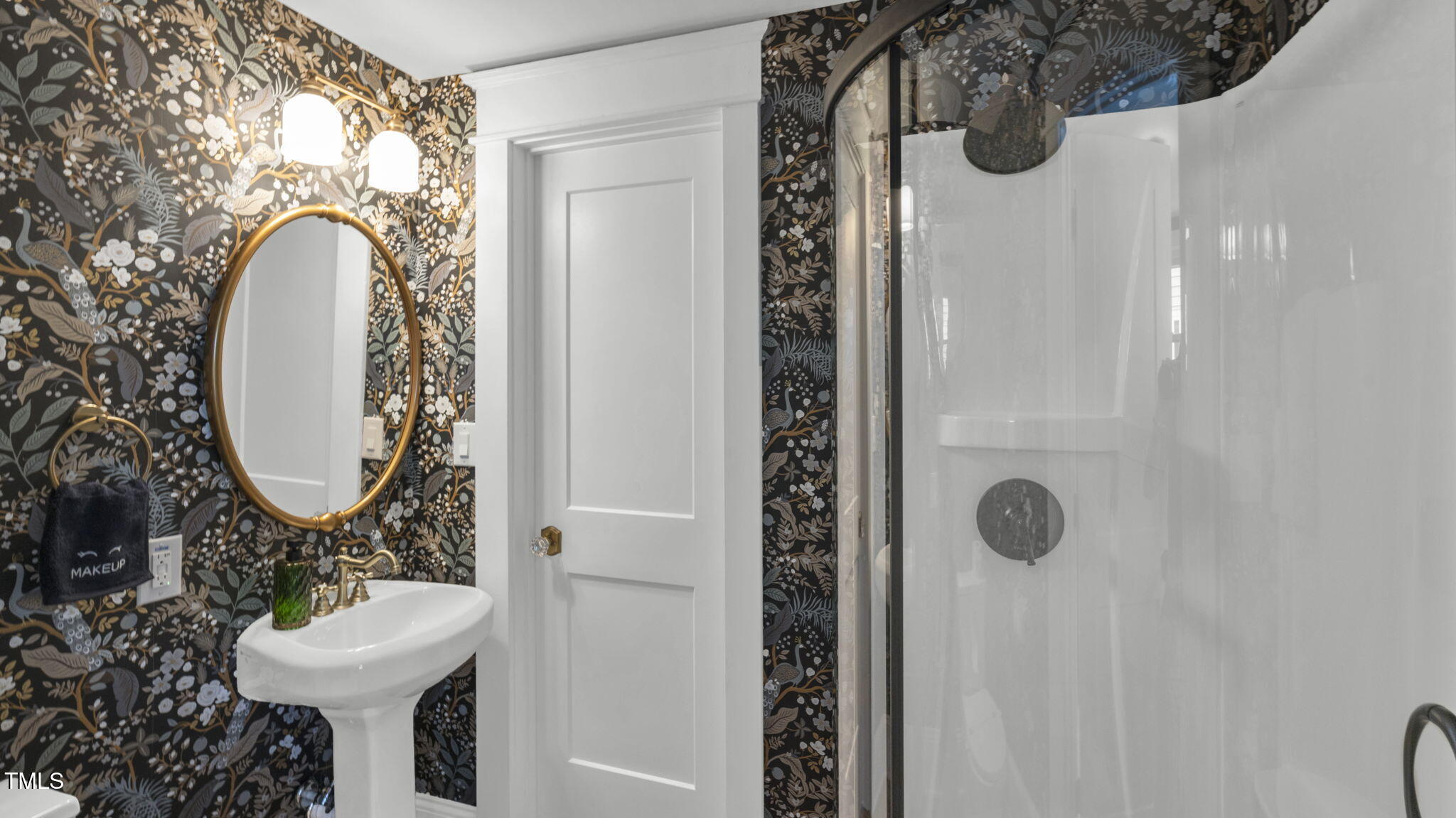 1307 Wake Forest Road Raleigh, NC 27604 - Photo 9 of 52 a bathroom with a sink mirror and toilet