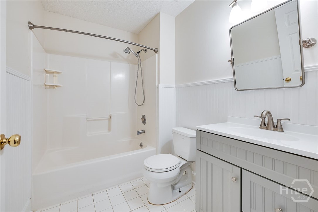 161 Jennifer Circle Rincon, GA 31326 - Photo 28 of 38 and then " the main bathroom