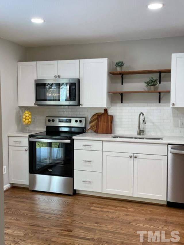 2409 Constitution Drive Raleigh, NC 27615 - Photo 2 of 16 NEW eat at bar area with quartz countertop