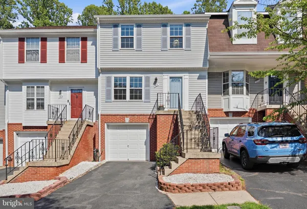 a car parked in front of a house