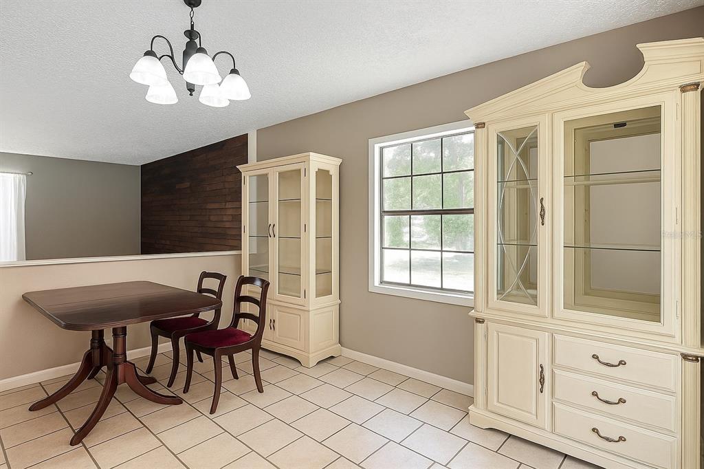 45 Forest Lane Bronson, FL 32621 - Photo 4 of 22 a dining room with furniture and window