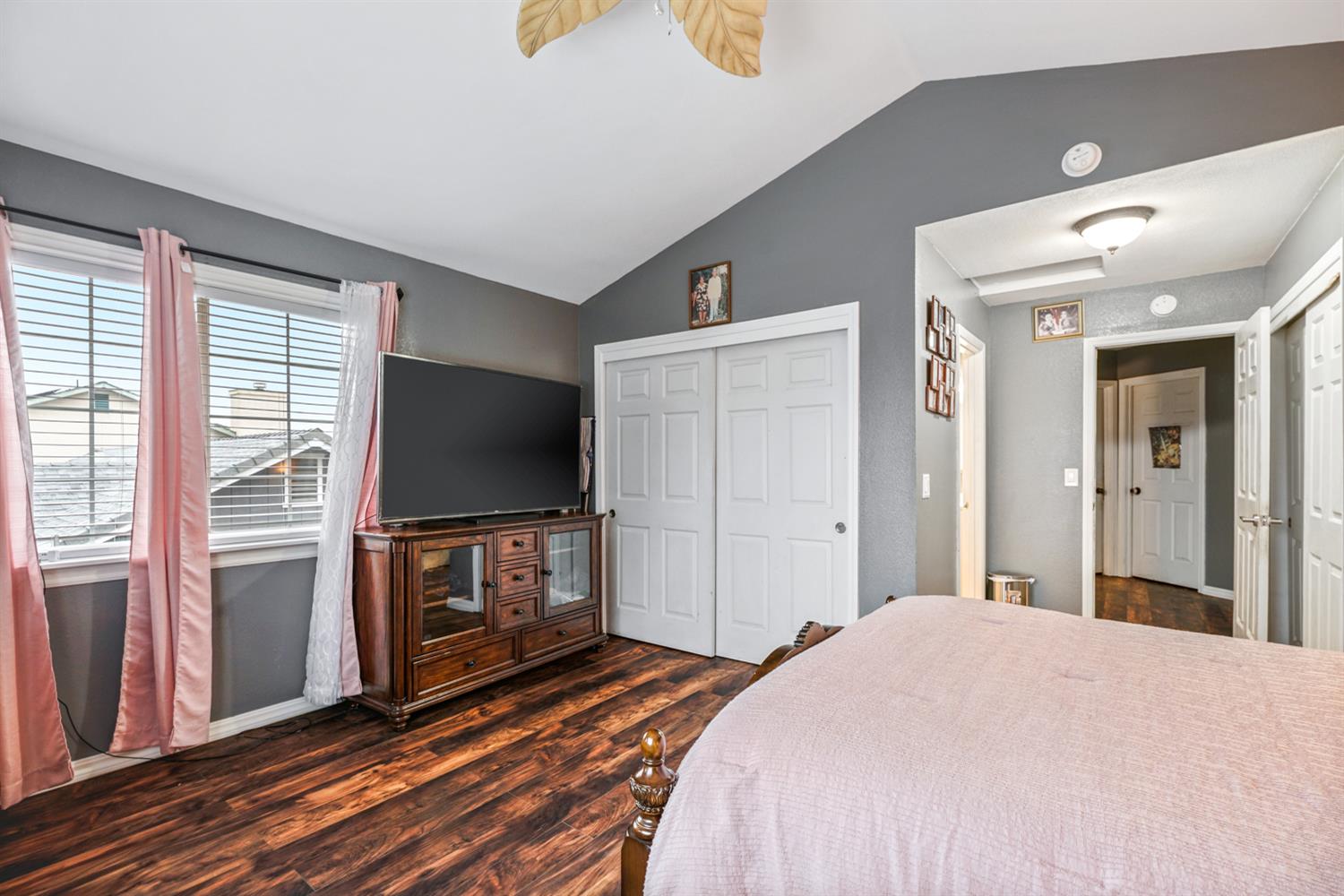 1755 3rd Street Lincoln, CA 95648 - Photo 16 of 22 a bedroom with a bed and a flat screen tv