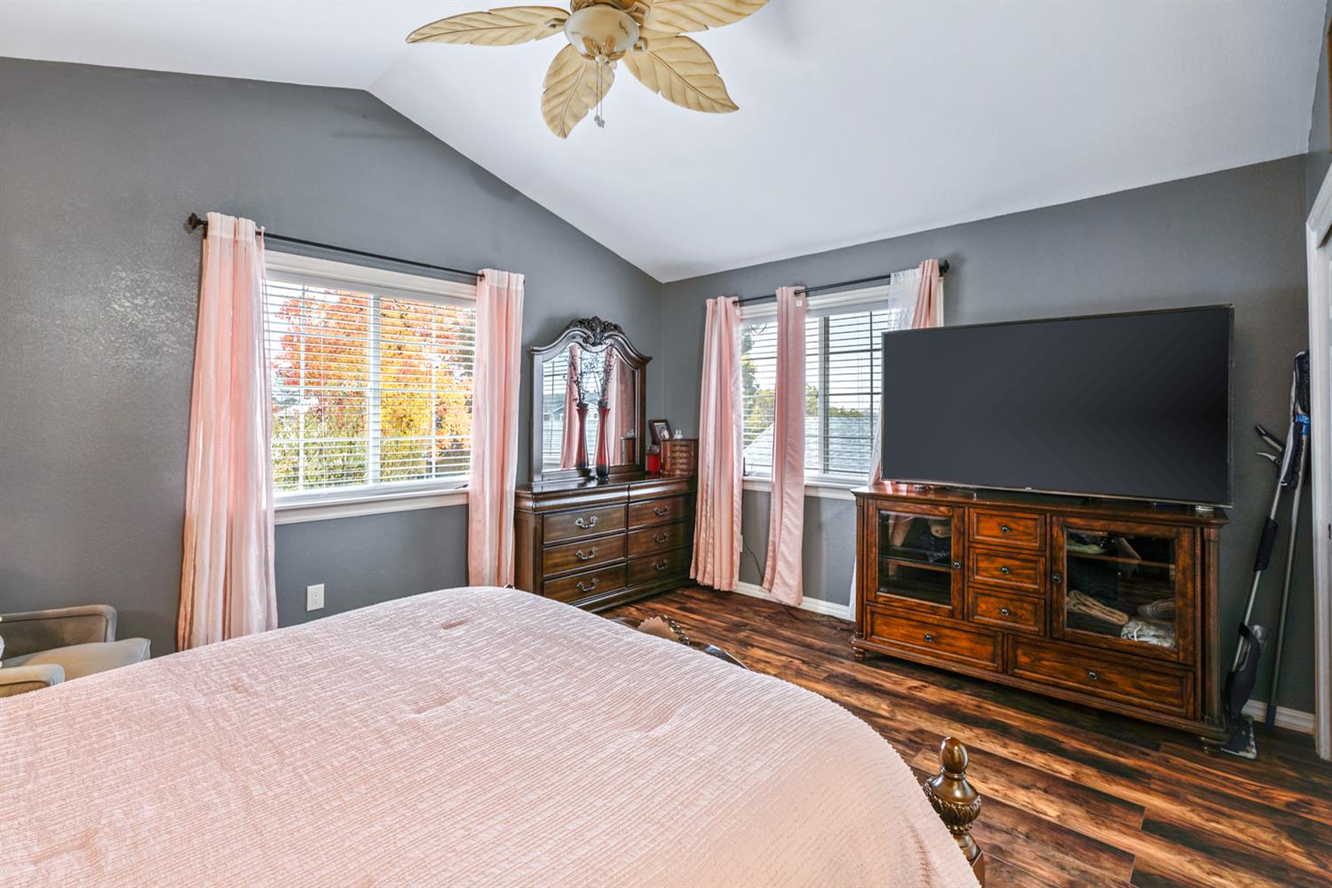 1755 3rd Street Lincoln, CA 95648 - Photo 17 of 22 a bedroom with a bed and a flat screen tv