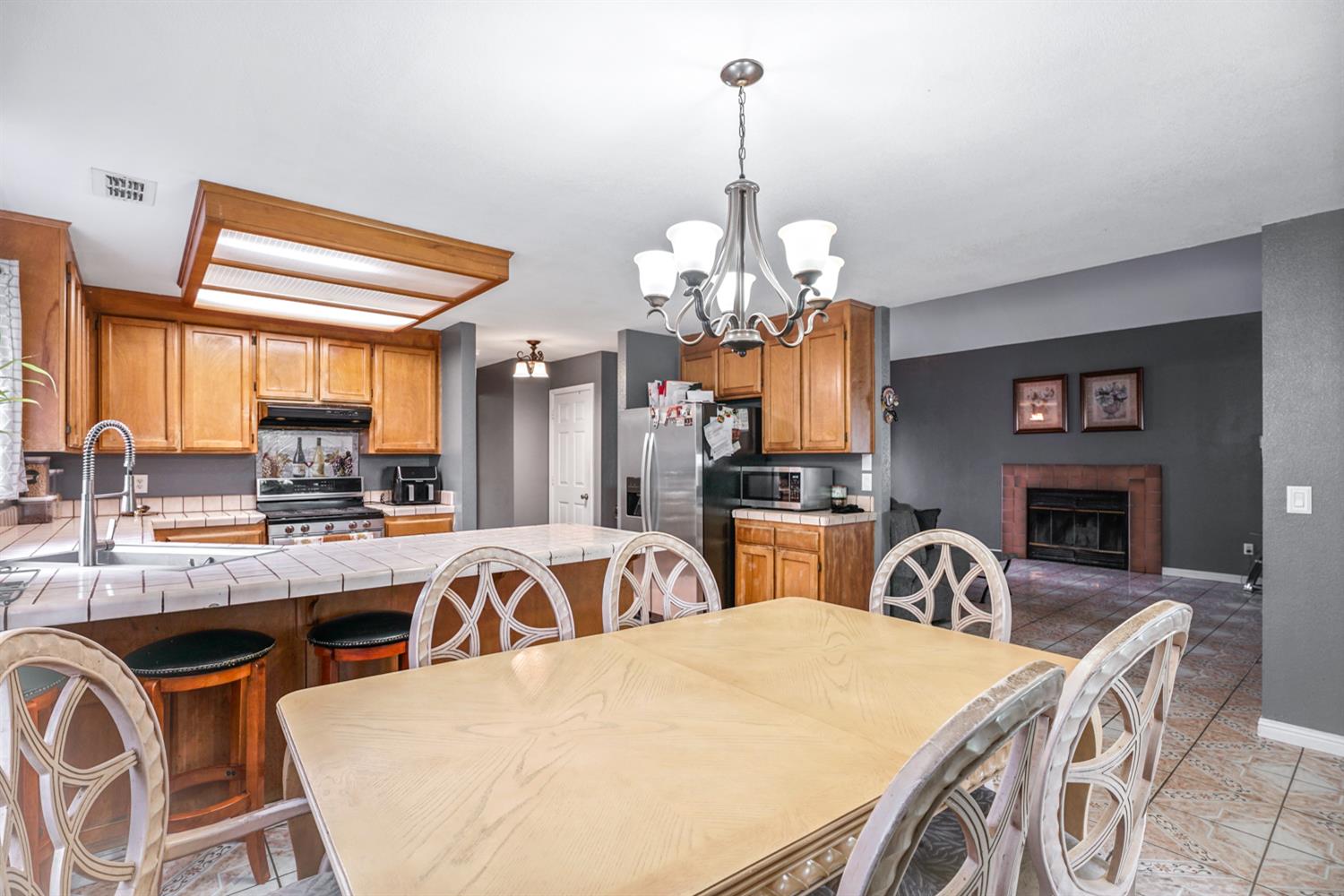 1755 3rd Street Lincoln, CA 95648 - Photo 7 of 22 a view of a dining room with furniture