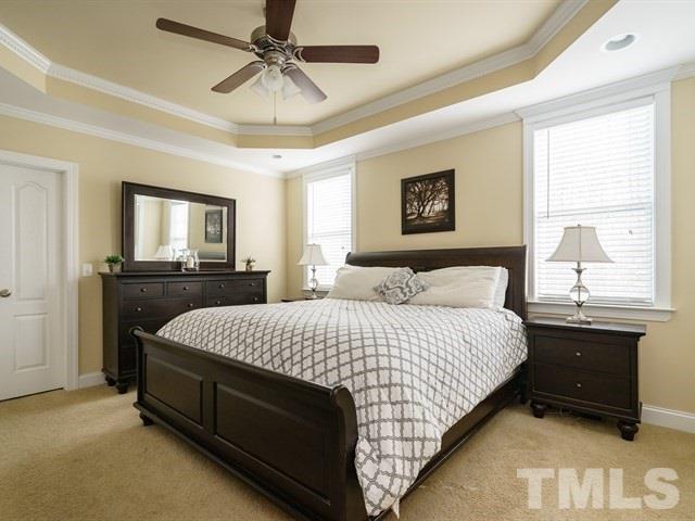 1729 Shell Cracker Drive Willow Spring, NC 27592 - Photo 14 of 22 a bedroom with a bed and window