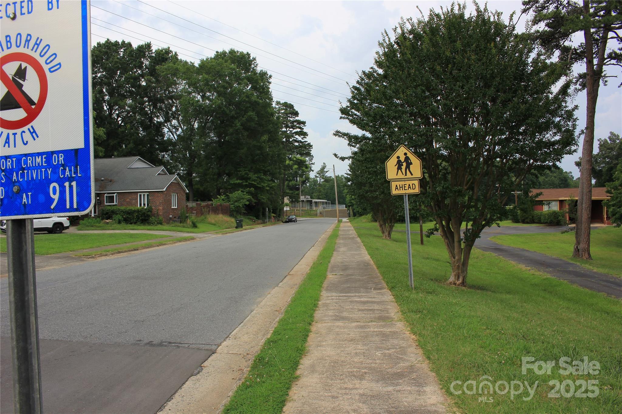 569 Union Street South Concord, NC 28025 - Photo 15 of 41 a road view with tall trees