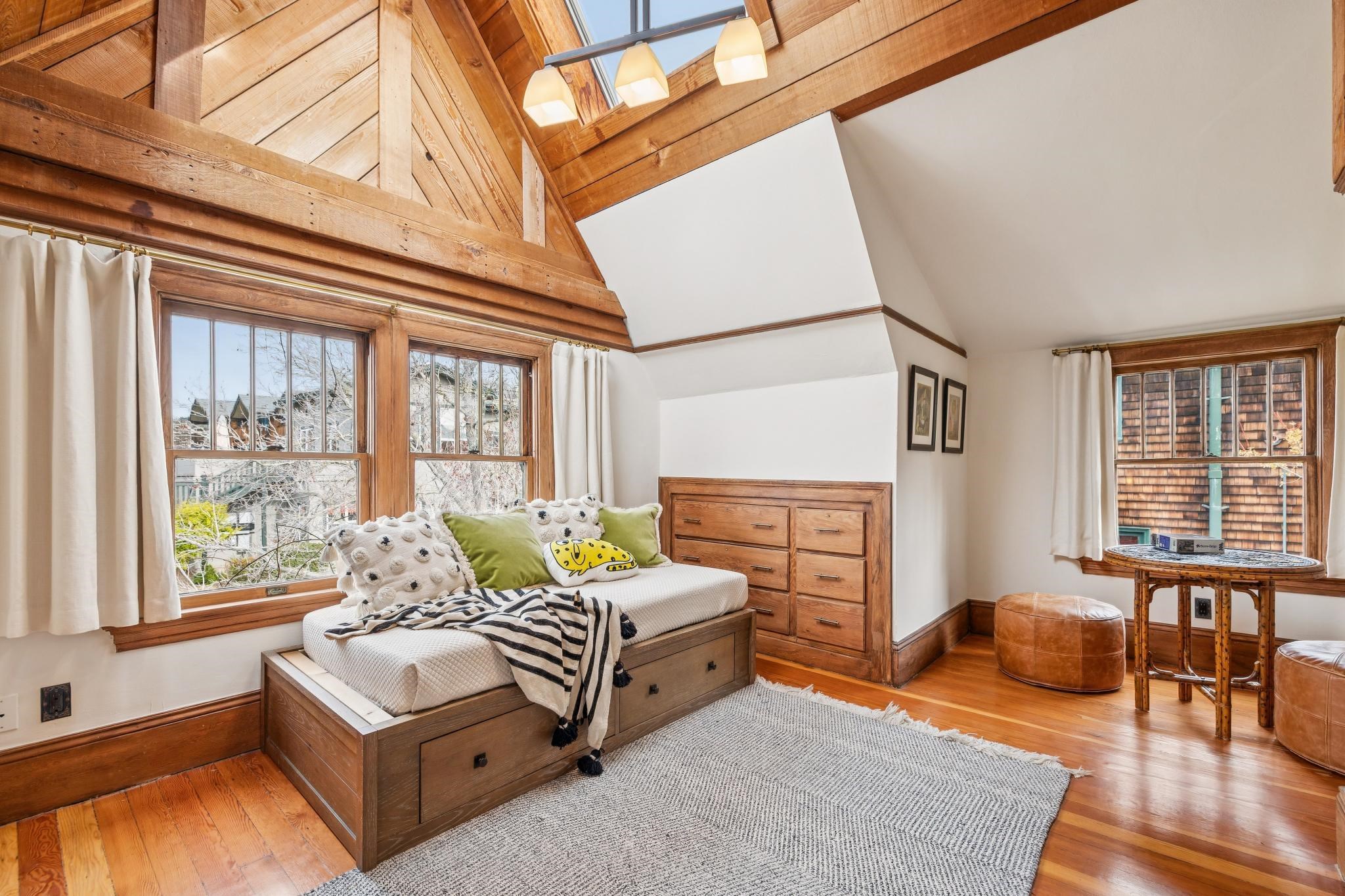 2012 Rose Street Berkeley, CA 94709 - Photo 28 of 57 Living area featuring hardwood / wood-style floors, plenty of natural light, and vaulted ceiling