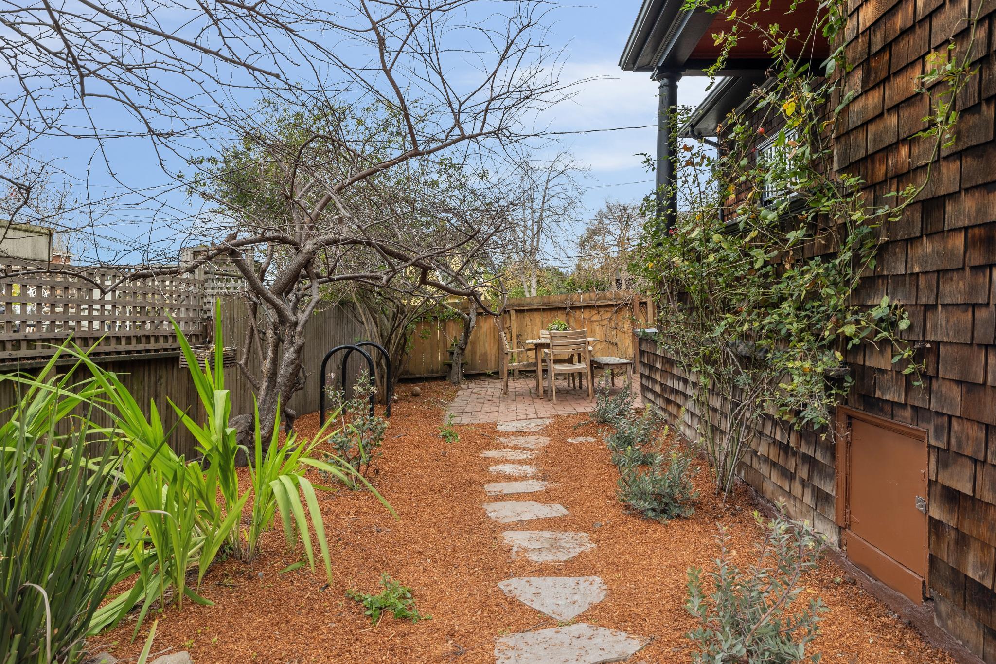 2012 Rose Street Berkeley, CA 94709 - Photo 51 of 57 Fenced backyard featuring a patio area and outdoor dining space