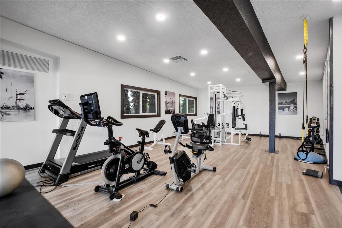 73850 Fairway Drive, Unit 18 Palm Desert, CA 92260 - Photo 29 of 42 a view of a room with gym equipment