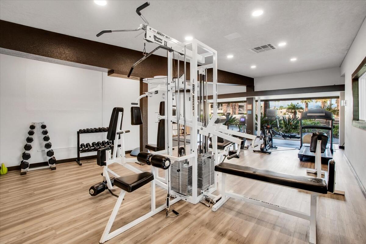 73850 Fairway Drive, Unit 18 Palm Desert, CA 92260 - Photo 30 of 42 a view of a room with gym equipment