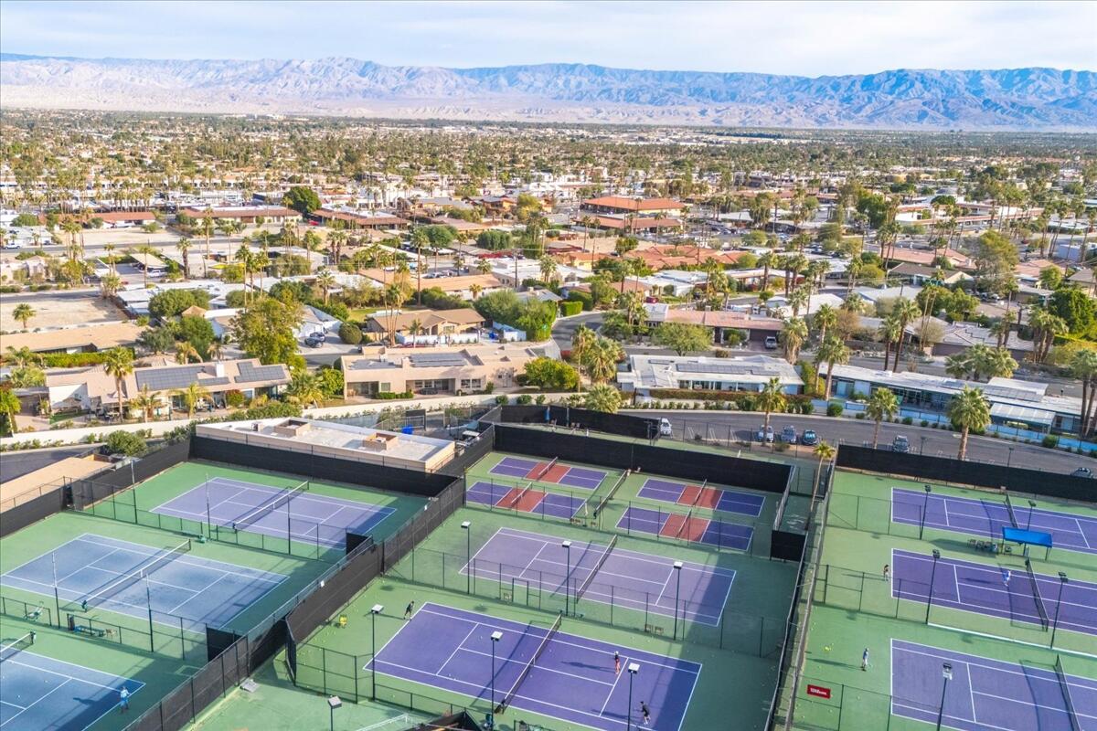 73850 Fairway Drive, Unit 18 Palm Desert, CA 92260 - Photo 36 of 42 an aerial view of residential houses and outdoor space