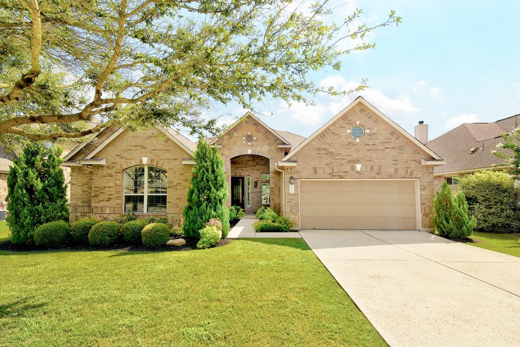 front view of a house with a yard