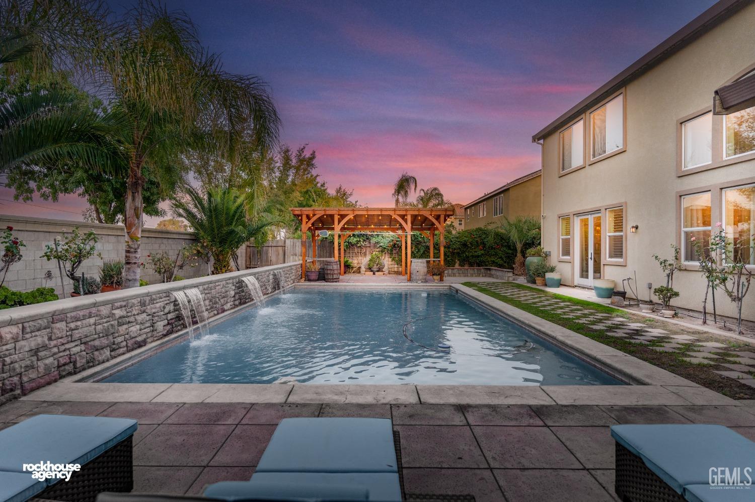 Undisclosed Address Bakersfield, CA 93314 - Photo 2 of 46 a view of a yard with cars