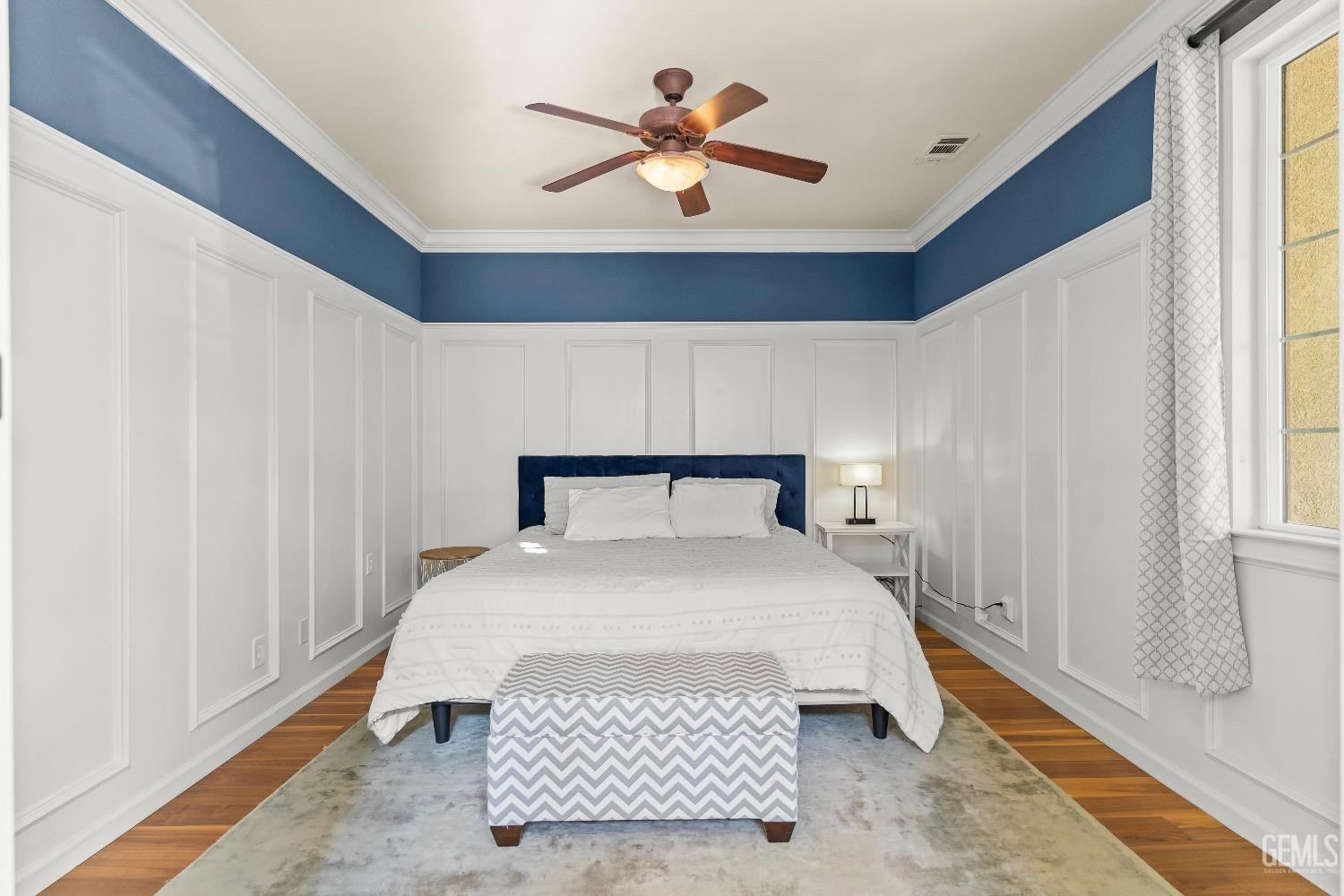 Undisclosed Address Bakersfield, CA 93314 - Photo 27 of 46 a bedroom with a bed and window