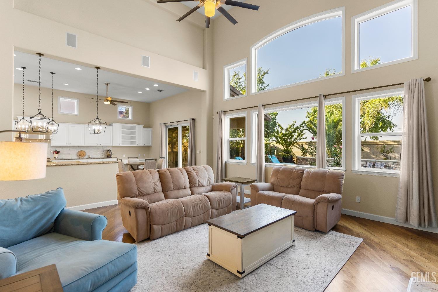 Undisclosed Address Bakersfield, CA 93314 - Photo 42 of 46 a living room with furniture and a large window