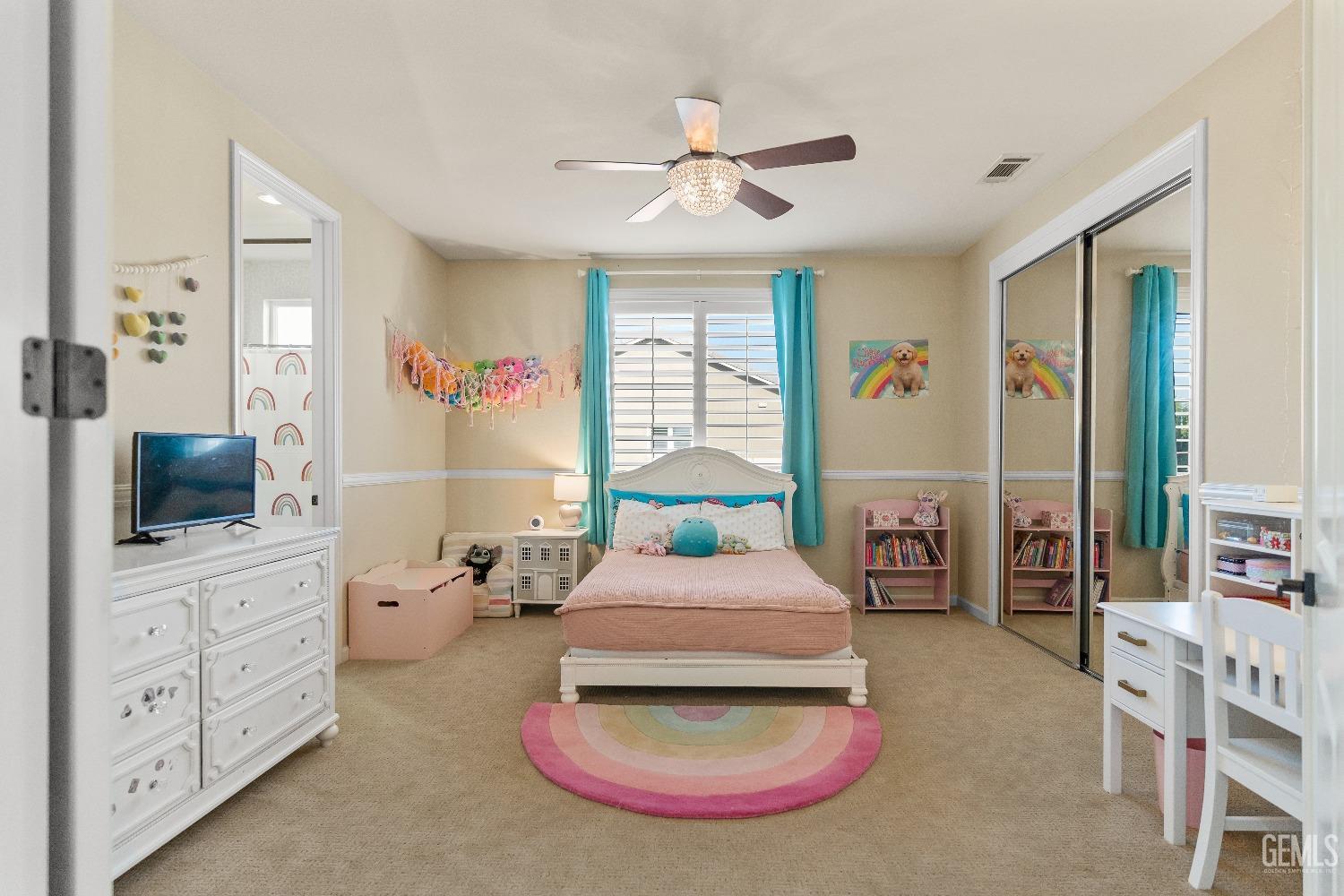 Undisclosed Address Bakersfield, CA 93314 - Photo 46 of 46 a bedroom with furniture and a flat screen tv