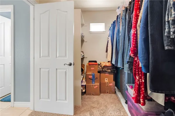a view of a hallway with windows