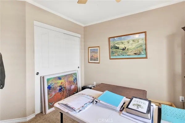 a bed room with a bed and a window