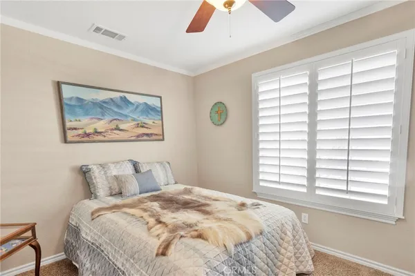 a bathroom with a double vanity sink and mirror