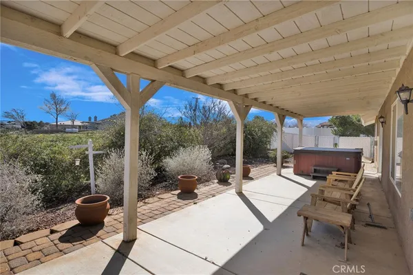 a front view of a house with a backyard