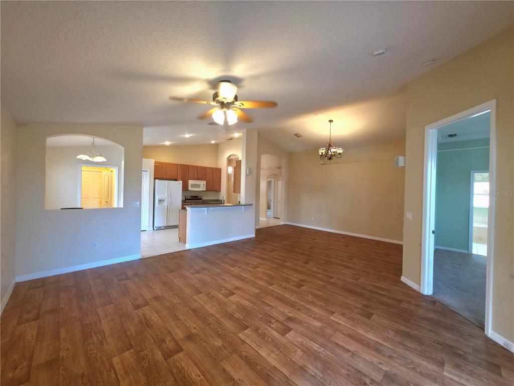 5465 High Pasture Way Melbourne, FL 32940 - Photo 11 of 39 a view of a livingroom with a chandelier