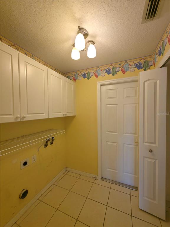 5465 High Pasture Way Melbourne, FL 32940 - Photo 15 of 39 a bathroom with a mirror and a shower