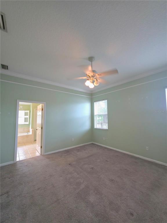 5465 High Pasture Way Melbourne, FL 32940 - Photo 16 of 39 a view of empty room with window