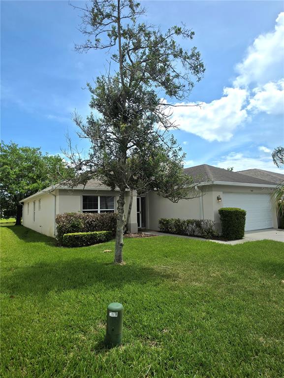 5465 High Pasture Way Melbourne, FL 32940 - Photo 2 of 39 a view of a backyard with a garden