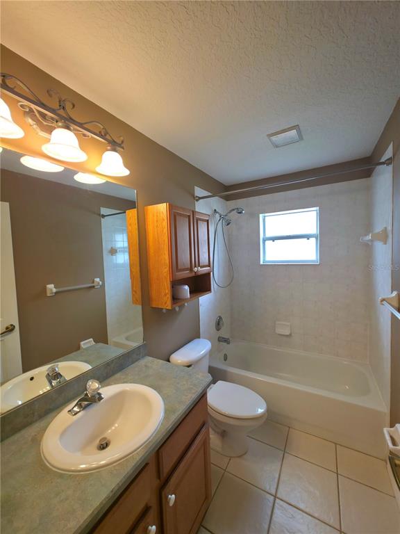 5465 High Pasture Way Melbourne, FL 32940 - Photo 21 of 39 a bathroom with a granite countertop sink and a mirror