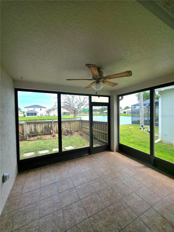 5465 High Pasture Way Melbourne, FL 32940 - Photo 23 of 39 a view of an empty room with a large window