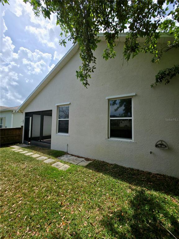 5465 High Pasture Way Melbourne, FL 32940 - Photo 25 of 39 a view of a backyard of the house