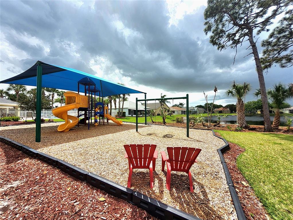 5465 High Pasture Way Melbourne, FL 32940 - Photo 32 of 39 swimming pool view with a sitting space