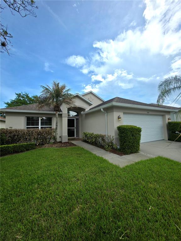 5465 High Pasture Way Melbourne, FL 32940 - Photo 5 of 39 a view of a yard in front of house