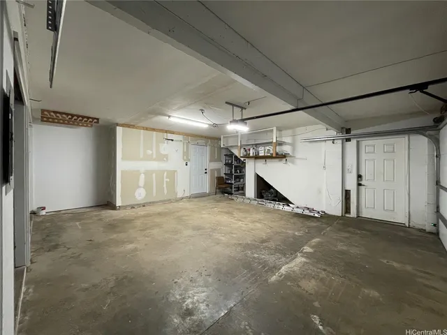 a view of empty room with closet