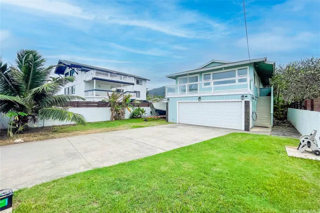 a view of a backyard with a small cabin