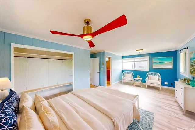 a bedroom with a bed and a room