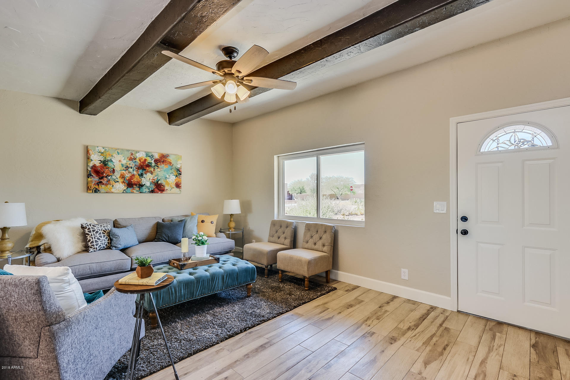 521 South Geronimo Road Apache Junction, AZ 85119 - Photo 11 of 40 a living room with furniture and wooden floor