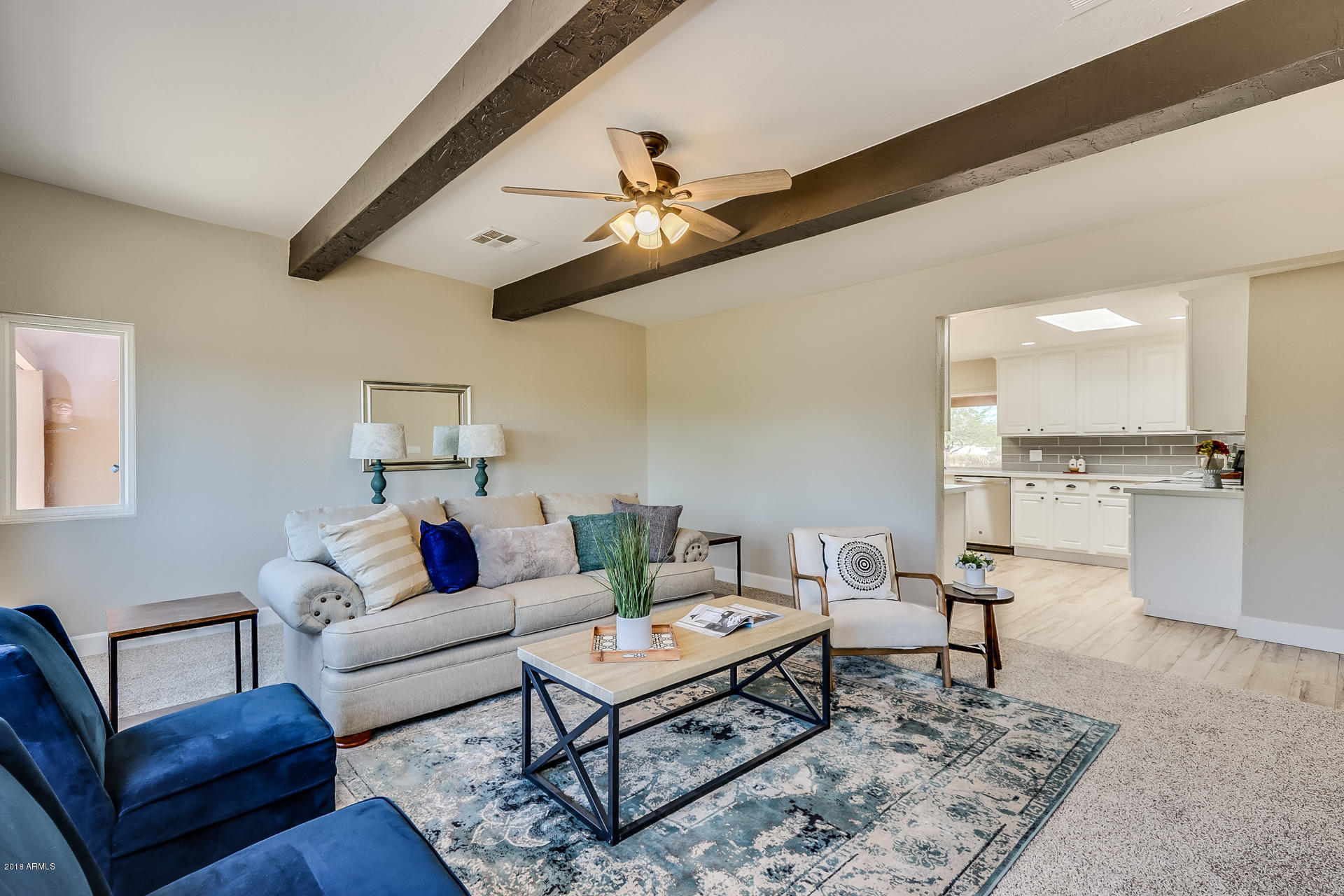 521 South Geronimo Road Apache Junction, AZ 85119 - Photo 24 of 40 a living room with furniture and a rug