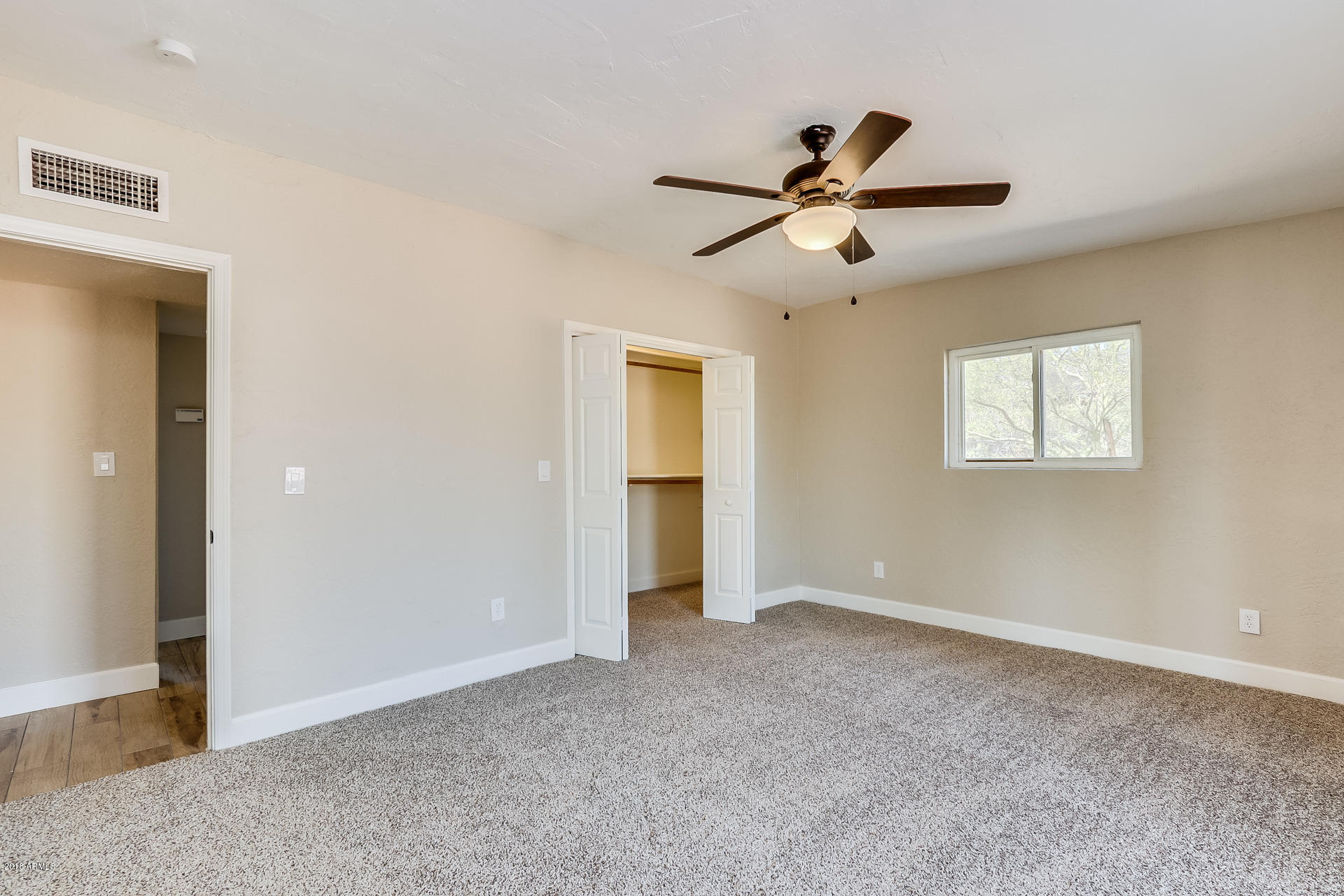 521 South Geronimo Road Apache Junction, AZ 85119 - Photo 39 of 40 a view of an empty room with a window