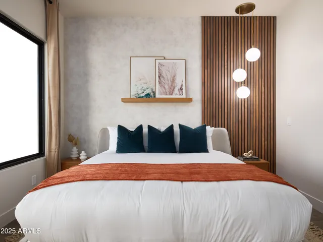 a view of a workspace with furniture and a table