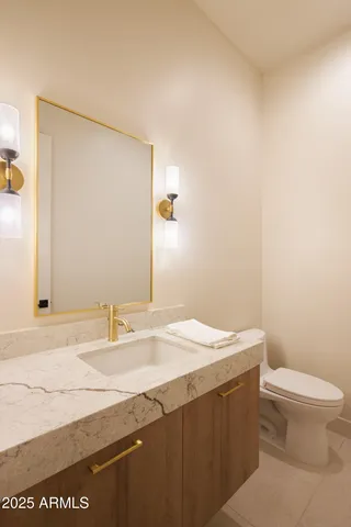 a view of roof deck with couches and sky view