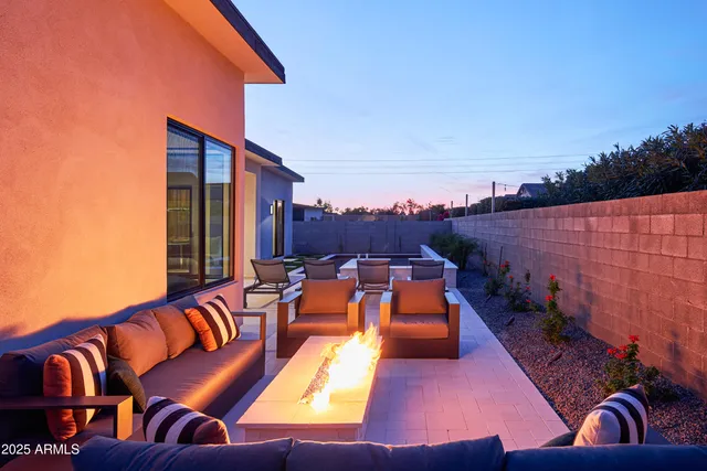 a room with lots of table and chairs