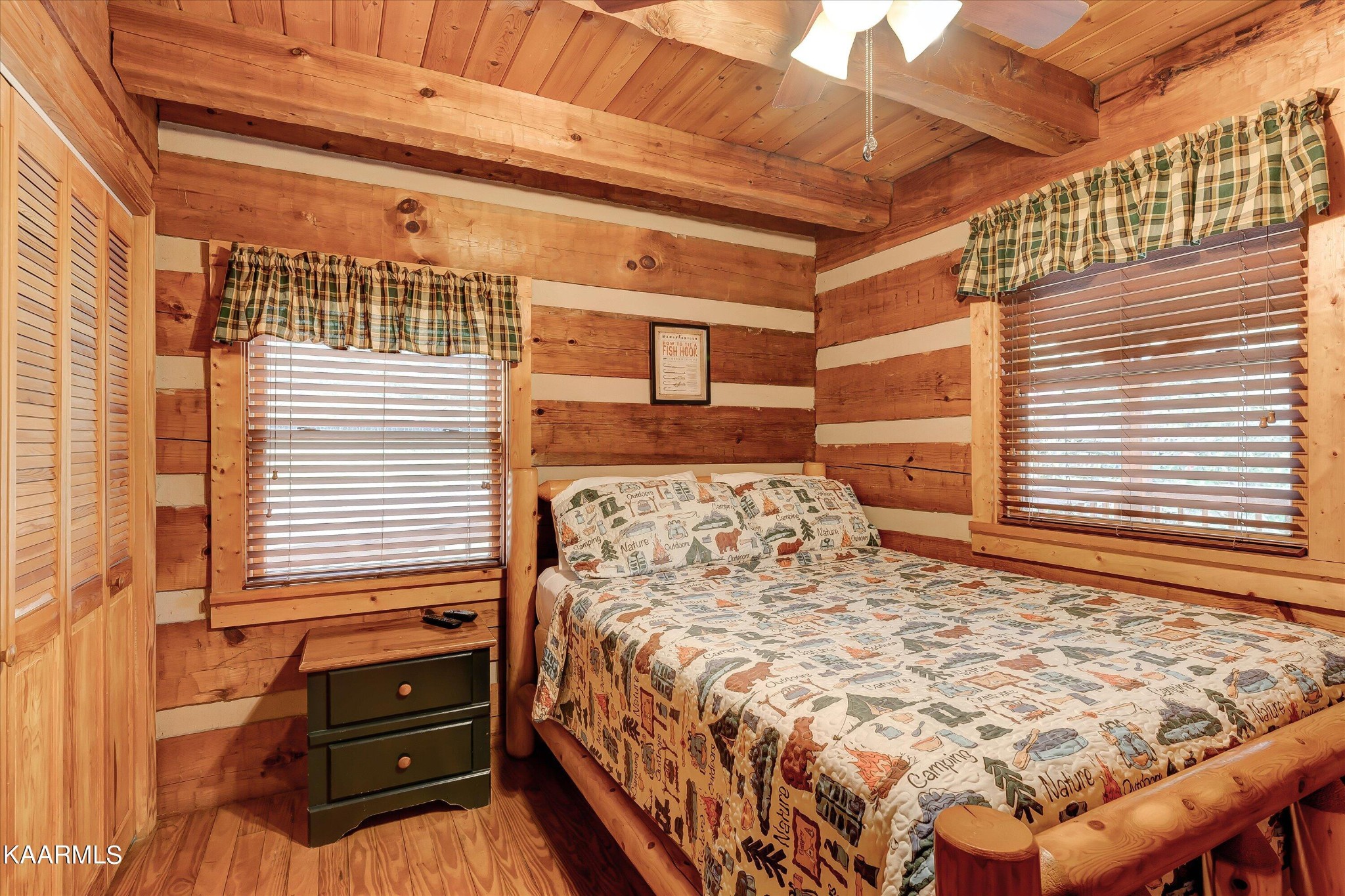 442 Hideaway Ridge Circle Sevierville, TN 37862 - Photo 11 of 40 a bedroom with a bed and a window