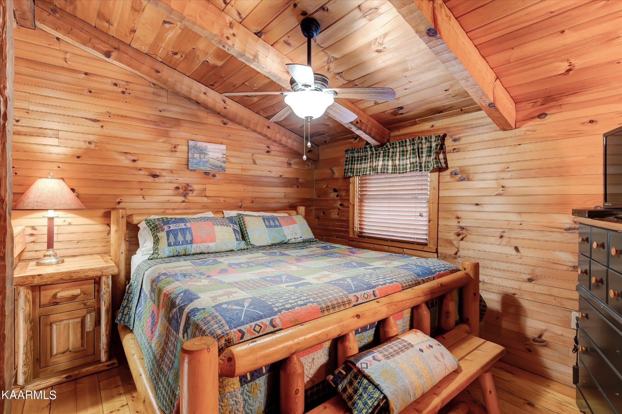 442 Hideaway Ridge Circle Sevierville, TN 37862 - Photo 14 of 40 a bed sitting in a bedroom next to a window