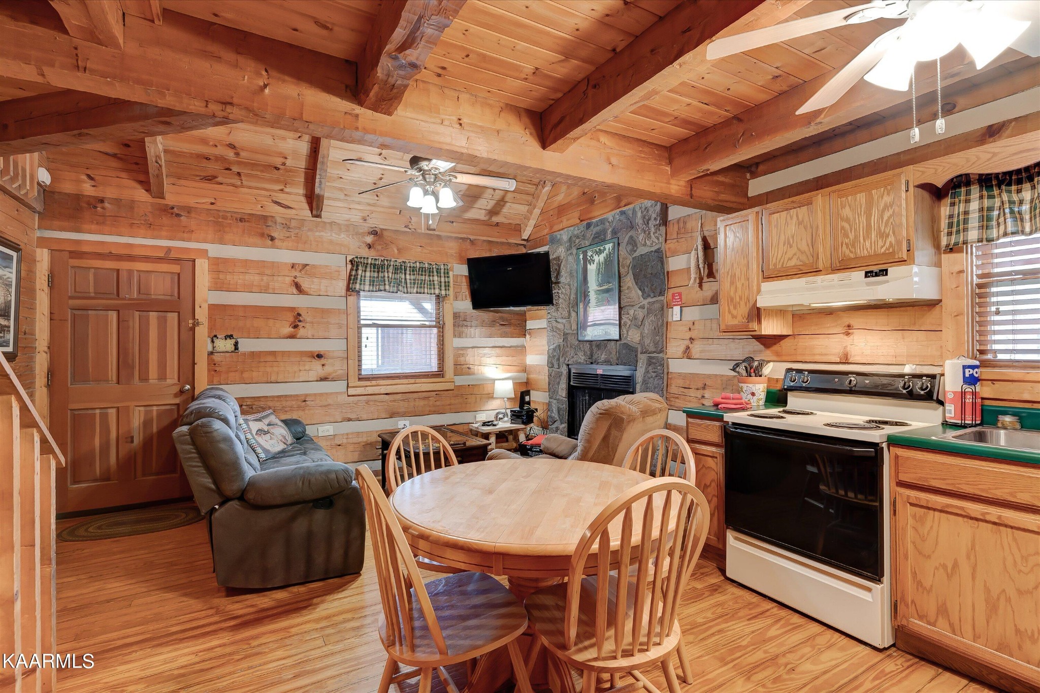 442 Hideaway Ridge Circle Sevierville, TN 37862 - Photo 6 of 40 a view of a dining room with furniture and wooden floor