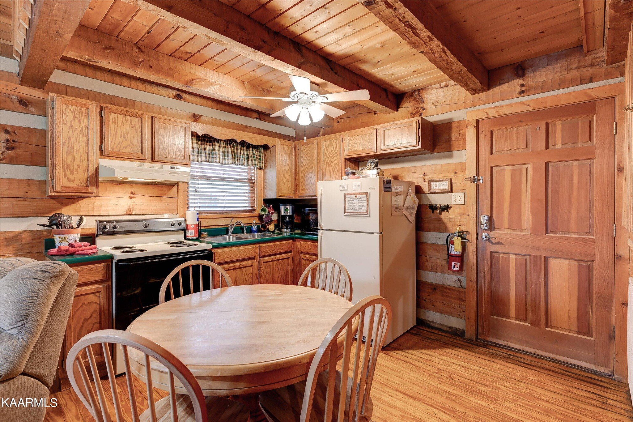 442 Hideaway Ridge Circle Sevierville, TN 37862 - Photo 8 of 40 a view of a dining room with furniture and wooden floor